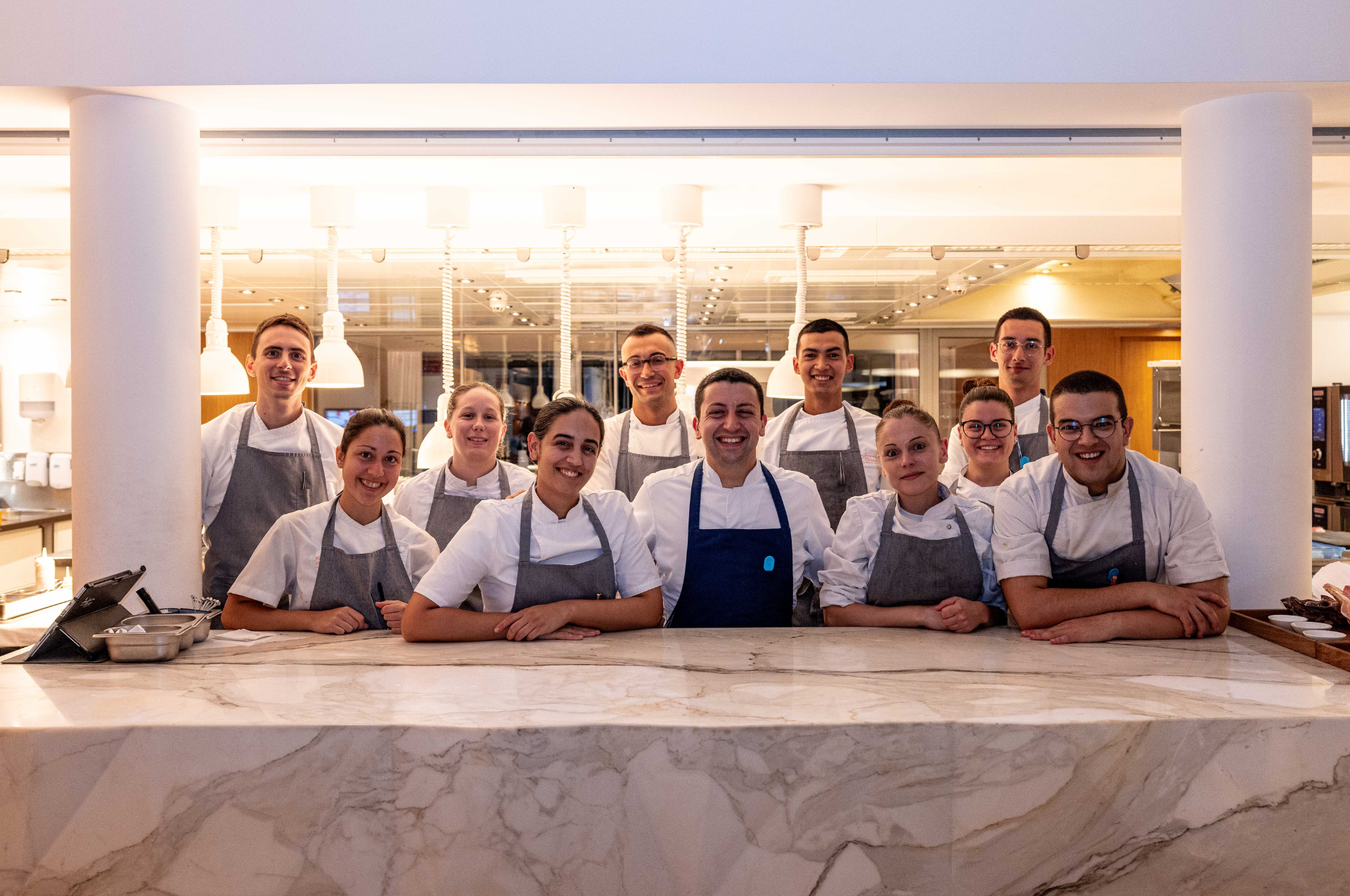 Ceto's kitchen team posing for the picture in front of the restaurant's kitchen