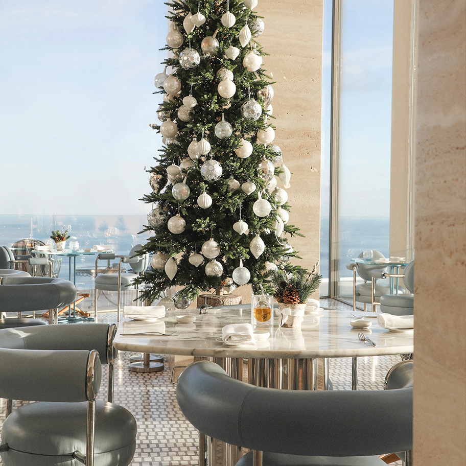 Christmas tree with white decorations at the Riviera Restaurant.