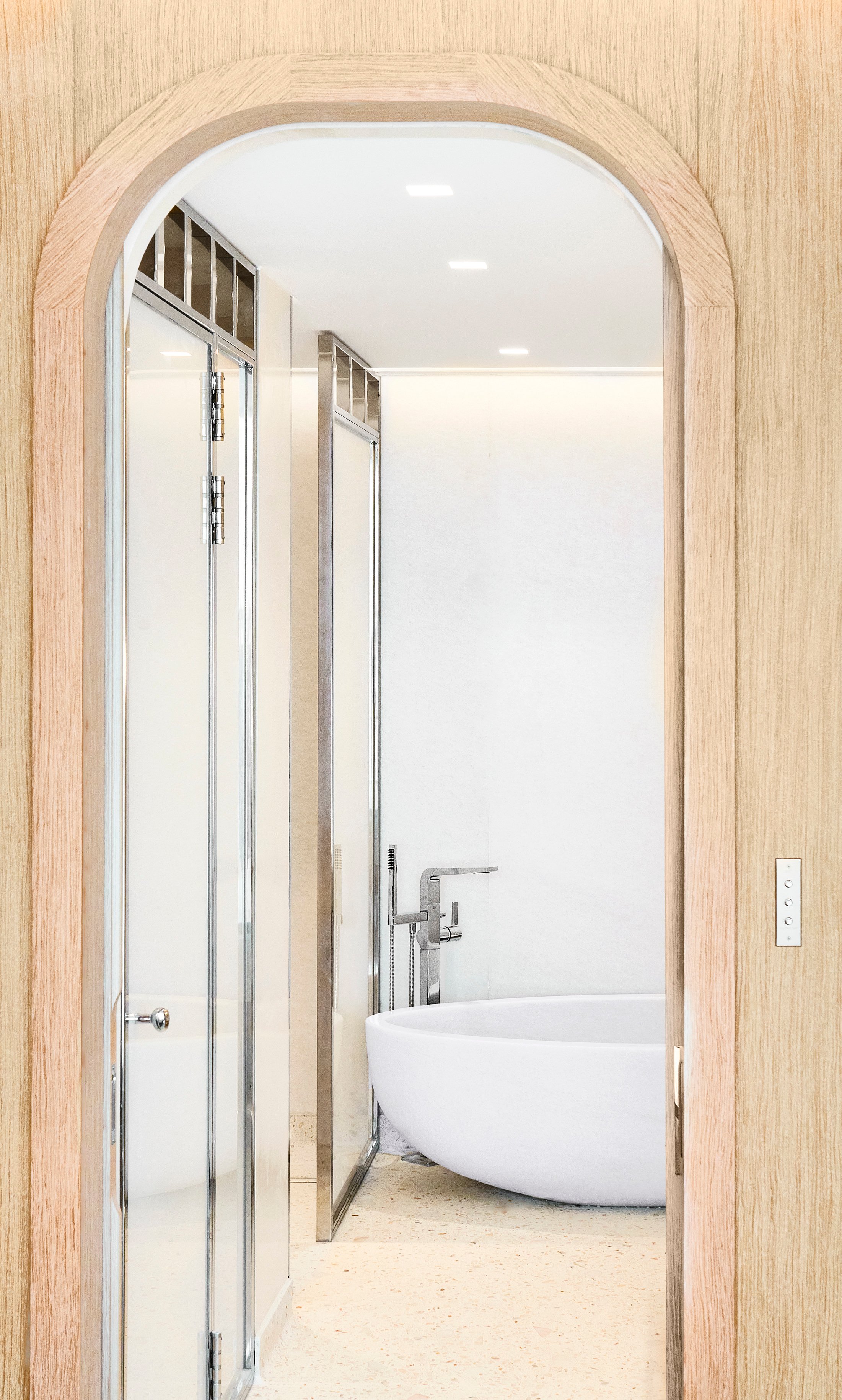 The Maybourne Riviera - bathroom with bathtub and mirrors on the wall