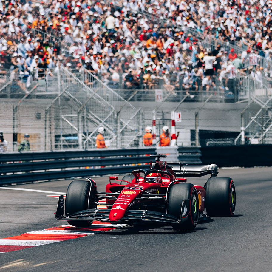 Red Ferrari F1 car on Grand Prix track