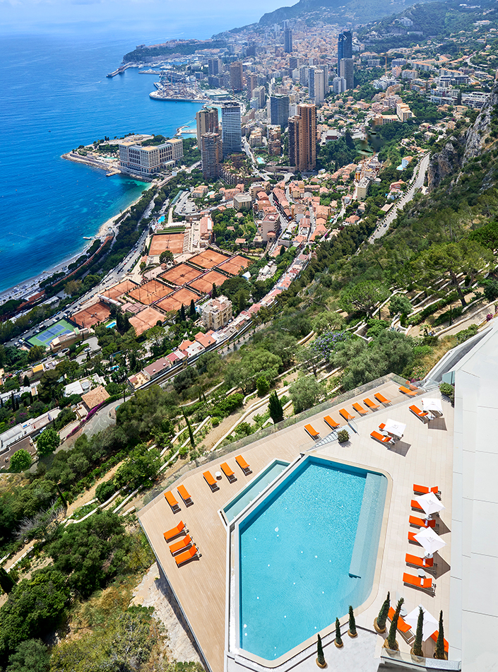 View on the pool at The Maybourne Riviera and the tennis courts at The Monte Carlo masters.